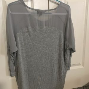 3/4 sleeve, really cute mixed media shirt.